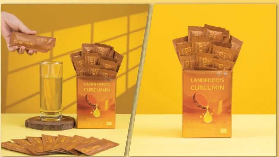 Hộp nước nghệ Landfood's Curcumin và những gói nhỏ pha cùng nước